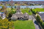 A Waterfront Masterpiece! This remarkable, expanded ranch offers direct access to the widest canal in West Islip, complete with a 140-foot bulkhead and a cut-in yacht slip. Perfectly blending luxury and practicality, this home is designed to provide an exceptional waterfront lifestyle.Situated on over an acre, the expansive layout features 3 (potentially 4) bedrooms (currently set up as an office) and 3 full bathrooms. The primary suite is a private retreat, featuring a spacious walk-in closet and a floor-to-ceiling marble bathroom complete with a steam room shower and Jacuzzi tub.The gourmet eat-in kitchen is a chefâ€™s dream, featuring an impressive 11-foot island, vaulted ceilings, and sleek granite countertops. Top-of-the-line appliances include a Sub-Zero refrigerator, Thermador oven and microwave, Wolf gas range, and a built-in ice maker. The kitchen seamlessly flows into the inviting fireplace seating area and formal dining room, offering the ideal setting for both casual and formal entertaining.The expansive great room, with its soaring ceilings, features cultured stone walls with a gas fireplace, exquisite Mahogany oak wood floors, and radiant heating throughout. The first floor also includes a river rock spa bathroom with a Finlandia hot rock sauna, providing a tranquil spa-like escape.Additional highlights of the home include a state-of-the-art security system with 24-hour surveillance, integrated stereo surround system (indoors and outdoors), smart home technology, central air, central vacuum, a convenient laundry room, new sprinkler system, generator-ready setup, and a two-car garage. The full, unfinished waterproofed basement offers ample storage or potential for future expansion.The exterior of this home is just as impressive, featuring natural stone, Hardy shingles, a 50-year roof, and Azek moldings. The outdoor patio, built in 2021 with travertine-colored pavers, wraps around the back of the house and includes a complete drainage system. Enjoy the outdoor theater with surround sound or relax on the stunning second-story balcony, which boasts natural stone and a weatherproof tile floor. Every detail has been thoughtfully crafted, ensuring the perfect fusion of luxury, comfort, and coastal living.