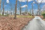 Significant Price Reduction â€“ A Rare Opportunity Awaits Its New Owner! Builders Delight! TWO ADJACENT LOTS, ONE INCREDIBLE PROPERTY! Get ready to seize one of the rarest real estate opportunities on the market today! Nestled in a serene, tree-lined haven, this extraordinary property offers TWO side-by-side parcelsâ€”individually zoned and measures 0.77 acres. The existing home currently extends across the dividing line between them. For this reason, the property is being offered as a combined sale to ensure a seamless transaction and to provide the new owner with full flexibility for future development or renovation. Whether restoring, rebuilding, or starting fresh, owning both parcels together maximizes the potential and value of this exceptional location. The setting is idyllic, the opportunity is rare, and the potential is enormous. Properties like this almost never come to marketâ€”especially not in such a prime location.