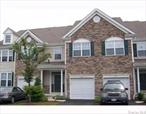 Enjoy this spacious 3-bedroom townhouse in gated community. well maintained complex- Great open floor plan that will be perfect for gatherings. Gas fireplace adds to the beauty of the living room. Sliding doors lead to a rear yard deck. New bathroom - Plenty of closet space- Unfinished basement with sliding door and windows. Can possibly be finished. Monroe-Woodbury Schools - Close to transportation and close to shopping-