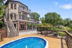 Discover this stunning 3-level lakefront gem in the heart of the Hudson Valley just a quick one-hour drive from NYC! With breathtaking lake and mountain views, this four-bedroom, three-bath home offers the perfect blend of serenity and convenience. Boasting exclusive lake and beach rights, itâ€™s an outdoor loverâ€™s paradise.. Located in the highly sought-after Blue Ribbon Cornwall Central School District. This recent remodel has three levels of brand new Trex decks, with seven decks total. The top level boasts an exquisite primary bedroom suite with vaulted ceilings, a wall of windows, and a private deck. A full bath with a Jacuzzi tub and a sitting/office area completes the primary suite. There is also a second bedroom on the top level. The second floor has a beautiful open living/dining area, a kitchen, dining room, full bath, and extra living area/game room with a pool table and vaulted ceilings. The bottom level offers a family room, two bedrooms, and a full bath with a separate entrance, allowing for a fantastic In-law suite for mother/daughter. It has plumbing ready for the lower-level kitchen with your dream vision. This level also includes an exercise room and a beautifully restored covered porch that leads to the outdoor living area, complete with a patio and Trex-deck enclosed pool. The outside property includes mature landscaping, front privacy fence, large parking area, front porch, walkway leading to the lake, pergola arbor, large storage area and a shed. The lake owners&rsquo; lake right includes a clubhouse and access to a private beach 2 houses from the property. Here&rsquo;s the kicker: This property has AMAZING potential to take in rental income on Airbnb or VRBO, making it not only great for families but an investorâ€™s dream in this sought-after getaway spot. Did we mention itâ€™s lakefront? Donâ€™t miss out on this rare opportunity!This home has all the privacy and accessibility the Hudson Valley offers. This property is a commuter&rsquo;s dream as well, perfectly located only 5 minutes from the Salisbury Mills train station, 10 minutes from Stewart International Airport, 15 minutes from West Point, and one hour from NYC.
