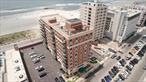 Experience Ultimate Luxury in this Spectacular Completely Remodeled OCEANFRONT 2 Bedroom & 2 Full Bath Boutique Condominium! The Rippling Blanket of Brochure-Blue Captivates your Senses the Moment you Walk Through the Door! Originally Built as a 3 Bedroom, the Living Room is Open & Airy & Features a Gas Burning Fireplace and Beautifully Tiled 150 SqFt Wrap-around Oceanfront Terrace! Every Inch Thoughtfully Curated: Harwood Espresso Floors with Tiled Mud Floor at Balcony. Designer Eat-in-Kitchen with Viking and Bosch Appliances and Hidden Outlets. All Brand New Heating & Cooling Units Throughout the Apartment and New Washer/Dryer in Unit! Both Waterview Bedrooms are Graciously Sized with Abundant Closet Space. The Primary Suite Features a Beautiful New Spa Bath with Built-ins and Deep Walk-in Closet. The White Sands Building is Beautifully Updated with New Lobby & Hallways. The Amenities include Concierge 6AM â€“ Midnight, Private Gym, & Dedicated Parking! Centrally Located Just Half a Mile to the LIRR, An Array of Eclectic Restaurants, Charming Cafes, Boutique Shops, Workouts, Weekly Farmers Market, Houses of Worship AND Right On The Beautiful Golden Soft Sandy Beach Stretching As Far As The Eyes Can See!