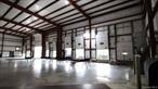 High-Clearance Warehouse in a Strategic Location. Located in the highly sought-after Commerce Industrial Park, this hard-to-find industrial-zoned property offers exceptional functionality for businesses seeking warehouse, distribution, or manufacturing space. With 30&rsquo; ceilings and a 27&rsquo; clear span ideal for racking, storage and production. NICE pull up doors. One is drive-in. 2 Offices and a large conference room/lunch room. Just one mile from I-84 (Exit 18), this location ensures seamless connectivity for logistics and distribution.