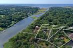 WESTHAMPTON .92 ACRE LOT WITH WATER ACCESS: Build Your Dream Home in Coveted Westhampton - Located south of Montauk Highway, this .92-acre vacant lot offers endless potential to design and build a custom home perfectly tailored to your lifestyle. The lot offers water access for kayaks and paddle boards and borders a 4-acre preserved parcel owned by the Town of Southampton! Enjoy close proximity to the Westhampton Beach School District, charming village shops and restaurants, and some of the area&rsquo;s most beautiful ocean beaches. There is also a .35 adjacent parcel available for sale.