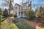 Step into timeless elegance at 203 8th Avenue, a beautifully preserved 1888 Victorian home nestled in the heart of the coveted Sea Cliff, NY. Imagine owning a piece of Sea Cliff history. Just a short, delightful stroll takes you to the beach, where you can soak in breathtaking Long Island Sound sunsets. Embrace the idyllic village life with walkable access to local shops, acclaimed restaurants, the library, and the top-rated Sea Cliff Elementary School â€“ all within this charming one-square-mile community just 25 miles from NYC.Preserving its original grandeur, the home boasts soaring 9-foot ceilings adorned with period medallions and chandeliers, expansive windows bathing the space in light, and elegant pocket doors. The main floor flows effortlessly from a spacious foyer into a bright, airy dining room connected to the large kitchen â€“ perfect for entertaining and everyday living. Relax in the inviting living room, featuring a cozy fireplace and a stunning stained-glass door that opens to the expansive wraparound porch. Picture yourself enjoying morning coffee or evening cocktails surrounded by the vibrant colors and sweet scent of over 100 rose bushes that grace the property.Upstairs, generously sized bedrooms provide peaceful retreats, enhanced by thoughtful details. A standout feature is the newly renovated, expansive third-floor attic. Complete with skylights and dedicated climate control, this versatile space offers endless possibilities â€“ a luxurious fifth bedroom, a spacious home office, a media room, or a dream playroom. Meticulously landscaped and fully fenced, the grounds feature a spectacular rose garden, mature rhododendrons, fragrant wisteria, fruit trees, and ample lawn space for recreation and relaxation. Enjoy effortless upkeep with an internet-connected irrigation system covering the entire property, including dedicated driplines for garden beds and trees.This home seamlessly blends vintage charm with modern necessities, including central air conditioning and a comprehensive, centrally monitored security system with sensors, smoke, and CO detectors for your peace of mind.Originally a summer retreat, Sea Cliff is now a vibrant, close-knit year-round community known for its picturesque streets, friendly atmosphere, and rich cultural scene. Enjoy year-round village events like the Mini Mart, Sunset Serenades, seasonal festivals, and strolls through the 16 neighborhood parks. Benefit from access to the highly-acclaimed North Shore School District, beautiful beaches, the Sea Cliff Yacht Club, and a thriving arts community.Your Historic Dream Home with Future Possibilities Awaits:203 8th Avenue isn&rsquo;t just a house; it&rsquo;s a piece of Sea Cliff history offering modern comforts, abundant space, a stunning private yard. Don&rsquo;t miss this rare opportunity to own an enchanting home with exceptional flexibility in one of Long Island&rsquo;s most beloved villages.Schedule your private showing today and discover the magic and potential of 203 8th Avenue!