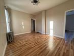 Step into this beautifully renovated 2-bedroom condo, located on the 4th floor of a walk-up building. Perfectly situated in a vibrant neighborhood, this charming unit combines modern upgrades with unbeatable convenience.