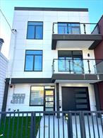 Welcome to 33-64 11th Street â€” A Brand New Three-Family Home in the Heart of Astoria!This stunning residence features three spacious two-bedroom units, each designed with modern living in mind. One unit includes exclusive access to a private garden and full basement, ideal for owner-occupants seeking extra space.Step inside to sun-drenched interiors featuring wide-plank engineered hardwood floors, expansive living/dining areas, and open-concept gourmet kitchens outfitted with sleek cabinetry and stainless-steel appliances. Each unit offers thoughtful touches like in-unit washer-dryers, roomy coat closets, and central HVAC for year-round comfort.Additional highlights include:-Private balconies for each unitShared rooftop access with sweeping views of Astoria and the Manhattan skylineDriveway and garage parking for added convenienceThis property presents an outstanding investment opportunity:-Live in the garden duplex and rent out the other two unitsOr rent all three for maximum rental incomeDelivered vacant for ultimate flexibilityLocated just blocks from the Astoria waterfront, Rainey Park, Costco, and a variety of local markets and restaurants, this home offers both tranquility and city access in one of Queensâ€™ most vibrant neighborhoods.Details:-Estimated Annual Taxes: $12, 000Lot Size: 25 ft. x 85 ft.Interior: 2, 841 sq ftExterior: 2, 161 sq ftDonâ€™t miss your chance to own this incredible new construction in a prime location.