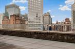 Welcome to NYC living at its best ! 12th-floor one-bedroom apartment with stunning NYC skyline views and a private terrace. The spacious foyer with hardwood floors flows into a bright living area and cozy kitchen. The generous living room features Northeast exposure, offering natural light and ample space for relaxing and entertaining.Step outside to the expansive terraceâ€”perfect for alfresco dining, entertaining, or enjoying morning coffee with incredible city views. The king-size bedroom offers peaceful surroundings, room for a home office, and spacious closets. Additional storage is available with a deep linen closet in the hall.Located in the sought-after Bryn Mawr in Lennox Hill, enjoy easy access to NYC&rsquo;s top medical centers, dining, shopping, and transportation. The scenic East River walkway is just a short distance away.Building amenities include a doorman, fitness center, sauna, landscaped roof deck, parking, updated laundry, bike storage, and rentable storage. A live-in superintendent ensures easy building management. Subletting allowed after one year, with pets and in-unit washer/dryer installations permitted (with approval).
