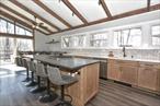 Motivated sellers and reduction of price from $680, 000 to $639, 000! Exquisitely updated 4 bedroom, 3 bathroom ranch in prestigious Laurel Ridge development in Tuxedo, NY. This residence provides a private, serene retreat while maintaining convenient train and bus access to metropolitan amenities. A newer gourmet kitchen (2022) features contemporary finishes and premium appliances. The kitchen and island were designed for both culinary enthusiast and effortless entertaining. Gatherings can continue onto the outside newer Trex deck or fenced in backyard. Abundant natural light glistens through numerous newer windows and along with 12-foot ceilings on the first floor; creates an open and airy atmosphere. The primary bedroom, ensuite, and walk-in closet are located on the 1st floor. Enhancements and modern upgrades include: electric panel, EV charger, gas hookup, water heater, custom blinds, windows, glass sliding doors, roof (50 yr. warranty), and much more. This home is located in the Monroe-Woodbury Central School District that proudly has won numerous awards! It would also be a wonderful weekend retreat; approximately 45 miles from New York City.