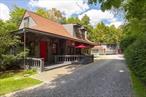 If you crave a truly unique property, love history or dream of hosting short term rentals, this property might be your ticket to ride. Built in 1889, the historic Train Station in the hamlet of Stanfordville is the only existing station remaining along the original former P&C line that ran alongside Wappinger Creek (known as one of the top 10 trout streams in NYS). Originally, the buildings consisted of the main passenger station, the coal shed and the freight shed each of which have been lovingly transformed into three warm and welcoming cottages that must be seen to be appreciated. The original Depot features a well-thought-out cook&rsquo;s kitchen complete with soapstone counters, granite sink, and full six burner Capital brand gas range featuring a wok ring, rotisserie and convection oven. Owner&rsquo;s Suite includes a landing area reading nook. The only bedroom is huge and light filled and finished with a wall of closets with a hidden office nook tucked away at the far end. The massive full bathroom holds a walk-in shower, soaking tub, yards of counter space and storage and a truly impressive vaulted ceiling. The stunning tiles featured throughout the bath were handmade by the master potters who previously owned the property. The the single bedroom Creekside Cottage with its tall central tower is accessed via the small deck surrounding the koi pond. As you enter, one half flight of stairs takes you to the full bath in the second story tower, and the second set leads down to the kitchen, living, dining and one large bedroom. There you will also enjoy a beautiful deck with stairs leading to the creek where you might enjoy the fire pit or tubing the length of the property between the bridges. The Warehouse Loft features a large living area and one massive bedroom, referred to as the Bunk Room, on the first floor, while the second floor kitchen, dining and entertaining area. A large storage area on the second floor holds potential to become an additional bedroom, or a full kitchen. This cottage also has a traditional one car garage as well as a greenhouse. Until recently, the two guest cottages were offered for short term rental, achieving high marks from visitors and earning the owners super host status. If your dream is to host guests, the Sellers are willing to help the new owner set up the website. Centrally located in Northern Dutchess County just 90 miles from New York City with easy access to Metro North, Amtrak, and the Taconic State Parkway., AboveGrade:3461, Below Grnd Sq Feet:200, EQUIPMENT:Smoke Detectors, FLOORING:Slate, Wood, FOUNDATION:Stone, InteriorFeatures:All Window Treatments, Gas Stove Connection, Washer Connection, Level 1 Desc:DEPOT(MAIN)HOUSE: LR, DR, KIT, BATH, BR, PORCH, PLAYROOM, Level 2 Desc:COTTAGE2: LR, KIT/DINING, BR, BATH, Level 3 Desc:COTTAGE 3: OPEN LIVING, BR, GAME AREA, BATH, Other School:PRIVATE, ROOF:Asphalt Shingles, Unfinished Square Feet:200
