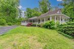 Welcome to 6 Swain Drive, a charming Cape Cod-style home nestled in the heart of Pleasant Valley, NY. This delightful residence offers 3 bedrooms and 1.5 bathrooms across 1, 680 square feet of comfortable living spaceAs you step inside, you&rsquo;re greeted by a sunlit living room featuring a beautiful bay window that bathes the space in natural light. Adjacent to the living room is a cozy family room, complete with a wood-burning fireplaceâ€”perfect for gatherings on cooler evenings. The formal dining room provides an elegant setting for meals, while the spacious kitchen offers ample room for a breakfast nook, making it ideal for casual dining. The home&rsquo;s exterior is equally inviting, boasting a picturesque yard adorned with mature landscaping. An expansive wraparound porch provides a serene spot to relax and enjoy the surrounding beauty. Situated on a generous 0.68-acre lot, this property offers both privacy and spaceAdditional features include central air conditioning, ensuring year-round comfort, and an attached one-car garage for convenient parking. Located within the Arlington School District, this home is also in close proximity to Metro North Trains, the Taconic State Parkway, County Route 9, the Mid-Hudson Bridge, and I-84. Nearby amenities encompass hospitals, shopping centers, malls, restaurants, colleges, and historic sites, including the renowned Walkway Over the HudsonExperience the perfect blend of comfort and convenience at 6 Swain Driveâ€”your ideal home awaits.