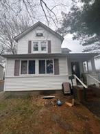 Welcome to an amazing investment opportunity in Port Jefferson Station to add to your portfolio or make your dream home. A single family with an accessory unit on the second floor, and partial basement ready for some TLC and imagination. Both floors are occupied and cash flowing. The first floor has 2 bedrooms and 1 full bath with room to be made into 3 bedrooms. The second floor has 1 bedroom and 1 bath, also with additional space for a 2nd bedroom, using the loft space above. The basement is partial and unfinished, ready for your layout ideas to come to life. Outside there is plenty of space to entertain and/or expand, plus a 2 detached two-car garage and additional parking space. Call or text to schedule your showing. Being sold As-Is (Tenant occupied, at least 24 hr notice would be appreciated) CASH/HARD MONEY LOAN