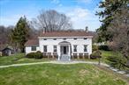 A former dairy farm provides the rare opportunity to own a piece of Dutchess County, New York, history. This Center-Hall, Federal Colonial Farmhouse, built circa 1820, is an outstanding example of early Greek Revival Architecture that has been lovingly restored and preserved for the ages. It has all the charm of a bygone era with all the modern amenities, making it the perfect place to spend your weekends--or an entire lifetime.  Offering both intimacy and grandeur, this home is breathtaking to all who enter. Original wood moulding, wide board floors and a working fireplace in the parlor make this home something out of a Norman Rockwell painting. Graced with an exquisitely preserved, colonial kitchen, this home comes complete with exposed wooden beams, an open brick hearth and a Dutch door that leads to a screened side porch from which to enjoy mature trees and a beautiful landscape. This unique home boasts an 18th Century Colonial Cage bar in its basement. Enjoy the revelry of The Tipsy Crow with family and friends along with the fruits of a nearby wine cellar. A first-floor sitting room can be easily converted to a bedroom, allowing one to age in place with an adjoining bathroom, complete with an accessible shower.   A roaring creek cuts through the heart of this estate of nearly three acres while the home is mirrored by a pond of glass, filled with fish and surrounded by daffodils in the spring and dragon lilies in the summer. A slate and stone patio allow for full enjoyment of this stunning property at every angle.  The property boasts a pond house for enjoying placid views in the summer and Rose Cottage, a sweet and charming abode where one can read a good book and escape the demands of the day.  While away your summer evenings as you dine at the stone table amid an orchard of fruit trees--while the youngsters toast marshmallows over the nearby firepit and prepare to spend the night in the custom-made treehouse, complete with a zipline.  A stately and expertly constructed two-car garage boasts a studio apartment above it--an ideal, creative workspace or an income-producing, living space for a caretaker, adult child, in-law or other lucky tenant.   Located in the heart of the historic Mid-Hudson Valley, this exceptional property is just minutes from Metro North and the Taconic State Parkway. Hyde Park&rsquo;s Vanderbilt Mansion, FDR Library and the Culinary Institute of America are just a few of the National treasures within reach of this extraordinary home.