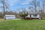 Welcome to this renovated split-level in Pine Bush schools with a large barn! This home PLUS large renovated barn is set just minutes from wine trails, orchards bursting with fruit, artisan breweries like Gardiner Brewing, and the magic of Sam&rsquo;s Point and the Ice Caves, this home is more than a placeâ€”it&rsquo;s a lifestyle. Fish in freshwater streams by day, catch a show at City Winery by night, and explore nearby gems like New Paltz, Mohonk, and Minnewaska at your whim.Step inside to sun-soaked rooms and an updated kitchen featuring a Sub-Zero fridge, opening to a cozy dining area and three full bedrooms with generous closets. Two full bathrooms offer modern comfort, while a fully finished basement adds a quiet office, living area, laundry, and stylish bathâ€”ideal for guests or working from home.The magic continues outside: a 3-season sunroom glowing with natural light and powered with electricity, a fenced backyard ready for pups to roam, and a one-car garage plus large barn with electricity and storage to spare.But the heart of this property is the fully finished barnâ€”a soaring 1, 350sqft sanctuary with high ceilings, custom-built bar, its own electrical panel, strong Wi-Fi, and space for art, gathering, music, or multiple vehicles. Whether it&rsquo;s a studio, an entertainer&rsquo;s dream, or something all your own, the possibilities are endless.