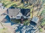 Expansive Cape Cod Retreat in Saugerties - Style, Space & Versatility on 3.6 Private Acres Welcome to your dream home in the heart of Saugerties! This 4000+ sq ft home perfectly blends design with everyday comfort, all set on 3.6 peaceful and private acres in the beautiful Hudson Valley. Inside, you&rsquo;ll find 3 spacious bedrooms and 3 full bathrooms on the main level, along with a light-filled, open-concept layout that includes both a formal dining room for elegant gatherings and an eat-in kitchen perfect for casual meals and everyday living. The kitchen features modern finishes and plenty of space to cook and entertain.A 1500 sq ft accessory apartment with a private entrance offers incredible flexibilityâ€”ideal for guests or extended family. You also have an additional 900 sq ft on upper level that is partially finished and plumbed for a 4th bath. Step into the expansive primary bedroom, a true retreat designed for comfort and indulgence. Bathed in natural light, this serene space offers for a king sized bed, sitting area and more. A massive walk-in closet with custom shelving and storage that rivals a boutique dressing room- offering both function and elegance. The en suite bath is pure luxury, featuring tiled walk-in shower, upscale fixtures, and a refined, spa like atmosphere. This home was designed with versatility in mind, featuring both an attached two-car garage and a detached two-car garage. The detached garage includes a large finished media room, perfect for entertaining, a creative studio, or a private escape. For those with recreational toys, there&rsquo;s extra storage space for an RV or other vehicles, making it an ideal base for weekend adventurers. The expansive outdoor area is beautifully landscaped with mature trees and ample space for outdoor activities. Enjoy serene evenings on the spacious deck overlooking the lush greenery, perfect for entertaining guests or simply unwinding after a long day. Whether you&rsquo;re entertaining, working from home, or simply enjoying the quiet beauty of nature, this home delivers space, privacy, and exceptional functionalityâ€”just minutes from vibrant Saugerties and Woodstock. Don&rsquo;t miss your chance to own this one-of-a-kind Hudson Valley gemâ€”schedule your private showing today!