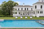 Discover the perfect blend of classic charm and modern luxury at The Garrison Estate. This exquisitely transformed 1930s Hudson Valley home was meticulously reinvented from top to bottom in 2023 and offers 6, 800 square feet of alluring living space on 12.28 acres.The colonial center hall has been painstakingly renovated to keep its traditional charm and elegance while infusing many playful and modern design elements. Entertain effortlessly in the expansive dining room, state-of-the-art media room, and resort-like pool area. Enjoy five private en-suite bedrooms which showcase their own unique style. Additional amenities include an EV charging station, 3 versatile accessory outbuildings, a dog wash station, a separate art studio, barn, mini farm, and an original 1900s tennis observatory overlooking a court-ready site. This extraordinary estate, located on the eastern side of the Hudson River, offers a serene retreat combining luxurious living with the best of the Hudson Valleyâ€™s natural beauty, just one hour from NYC.