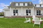Ask for exact dates and pricing. Flex Dates available. Ask about off season or extended season rates. This recently renovated beach escape blends modern comfort with classic Hamptons charm. Located just minutes from the Ponquogue Bridge and some of the best ocean beaches and restaurants in Hampton Bays, this 4-bedroom, 3.5-bath rental is made for effortless summer living.Inside, the open-concept layout features a sleek kitchen with oversized island seating for six, a half bath off the kitchen, and a formal dining area that seats ten and flows seamlessly to the outdoor entertaining spaces. Two staircases lead to the upstairs sleeping quarters, where four bedrooms awaitâ€”two with en suite baths, including a spacious en suite primary with smart TV and seating area. One guest room enjoys its own en suite bath and private balcony with water views, while two additional bedrooms share a full bathâ€”one of which also has a balcony overlooking the water.Outdoors, youâ€™ll find everything needed for a perfect Hamptons stay: a pool, Adirondack-lined porch, grill, lawn space for games, a fire pit for evening gatherings, and an outdoor shower for sandy toes.Additional features include a washer/dryer combo and Apple TV above the fireplace for cozy movie nights. Garage is not included.Water views and water access complete the packageâ€”welcome to your summer haven in Hampton Bays.Flex Dates available. Ask about off season or extended season rates.