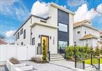 Exceptional 2-story smart home, completed in 2020, offers modern elegance and convenience. Located on a double lot, just steps from the train for easy commuting. Inside, custom finishes elevate every space, including a chefâ€™s kitchen with a Fisher Paykel fridge, Bosch dishwasher, and two sinks, complemented by a central island. The expansive living room features a wood-burning fireplace, and the luxurious primary suite with a spa bath, smart shower with heated floors, and a chrome therapy jetted tub. The main level also includes a large guest suite, playroom or office, and a kitchenette with a dry bar and remote shades. Upstairs, designer-curated bedrooms with Stark and Stanton carpet add a touch of luxury, while engineered hardwood floors run throughout. The finished basement offers additional living space, including laundry and an office. The private backyard is ideal for entertaining, with room for a pool! Conveniently located near shops, restaurants, and the beach, this home combines high-end living with unbeatable style!!