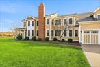 A Masterpiece of Historic Charm and Modern SophisticationSouth of Montauk. Over 6, 500 square feet. One of a kind.Step into timeless elegance at this showstopping 1875 Victorian estate, completely rebuilt in 2008 with no expense spared. Nestled on just over one acre of private, manicured grounds, this home offers more than 6, 500 square feet of living spaceâ€”not including a 2, 000 square foot walk-out basement thatâ€™s ready for your vision.From the moment you arrive, the exterior commands attention with cedar siding, hand-laid red brick chimneys, and detailed masonry. Inside, every detail has been curated for impact. Brazilian cherry hardwood floors with maple inlays. Five fireplaces. Hand-carved woodwork that tells a story in every room.The kitchen is nothing short of exceptional. Outfitted with premium appliances, propane cooking, dual dishwashers, and a wood-burning stove that doubles as a pizza oven, it&rsquo;s built to entertain and built to last. The formal dining room, expansive living areas, and a private guest suite on the main level make hosting effortless.Upstairs, the primary suite is a retreat unto itselfâ€”complete with a fireplace, private balcony, sitting area or office, and a spa-caliber bath featuring a steam shower. Three additional bedrooms and beautifully appointed bathrooms round out the second level.For car collectors and hobbyists, the six-car garage with 9-foot doors and 13-foot ceilings offers room for everythingâ€”tools, toys, and dreams alike.Outside, a heated gunite pool delivers resort-style living, while the 500-gallon propane tank keeps things running efficiently. And the 2, 000-square-foot walk-out basement? With high ceilings, a fireplace, and separate access, itâ€™s the perfect blank slate for a gym, home theater, or guest retreat.With four-zone heating, central air, a 1, 000-gallon oil tank, and oversized water main, comfort and performance are built into every square inch.Located just minutes from top-rated schools, shopping, parks, and major transportation, this home offers more than luxuryâ€”it offers a legacy. Whether you&rsquo;re hosting on a grand scale or carving out your own private sanctuary, this is a rare opportunity to own a historic estate completely reimagined for modern living.