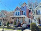 Gorgeous, fully detached Victorian with 4 spacious bedrooms, 3 full bathrooms, and sun-drenched interiors, this home features oversized windows, gleaming hardwood floors, and a flowing layout perfect for living and entertaining. Charming front porch and private rear deck overlooking the yard.Finished attic offers a full bath, skylights, and flexible spaceâ€”perfect for a home office, guest suite, or studio. A 1-car garage adds convenience, with additional outdoor space for parking or creative use.