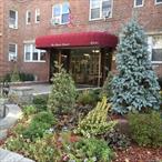 Welcome to the sought after Rhode Island Coop in the heart of Rego Park. Rare opportunity to own only 1 of 4 studio apartments in this building. This bright and sunny studio offers a spacious living space and bright rooms. There are hardwood floors throughout and 3 large closets with a dressing area. In addition you will find a windowed kitchen and a separate dining area conveniently located right next to the kitchen. The windowed bathroom offers a large jacuzzi tub. The Rhode Island is a meticulously maintained building with part time doorman, security cameras, laundry room, storage room, garage parking (waitlist) and parking options across the street. Cats and dogs are allowed with board approval. Near all forms of transportation, shops and restaurants.