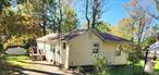 Sweet Smallwood 3 season cottage is now on the market. Considerable eat in kitchen has plenty of cabinets, gas stove and ample countertop space for large family meals. Plenty of social gathering space in the living room and a newly added spectacular family room perfect for movie nights with gorgeous, warming, propane fireplace. Step out onto wrap around deck for sunrise coffee or sunset cocktails. Grassy knoll can be fenced to create a private outdoor firepit lounge. Newer windows, wood floors and roof that is 8 years old. Be part of the Smallwood lake community with a sandy beach, non-motor boating, fishing, outdoor sports court, walking trails near the waterfall, outdoor exercise equipment and dog park. The Club at Smallwood has heated pool with daily and nightly activities. The amenities and adventures are abundant. Nearby Bethel Woods, Resorts World Catskill Casino, Kartrite Waterpark, lakefront dining, festivals and farmers markets. Visit the lakes, mountains and rivers. Own a piece of the Catskills. Call to take the tour!