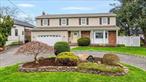 Discover this expansive Colonial home, ideally located in Sequams Colony in West Islip with access to association docking with a boat slip available. This home offers modern comfort and style. This home includes inground sprinklers, central air conditioning, 200-amp electrical service and a gas fireplace. The kitchen boasts radiant heat for added warmth and comfort, and the entrance hall and half bath feature the same luxurious touch. Beautiful hardwood floors flow throughout the living room, dining room, and second floor. Step outside to your private backyard retreat, complete with a spacious patio and custom pavers. Relax beside the inground free form Gunite heated pool, with a stunning rock waterfall as the centerpiece. Entertain with ease in the outdoor kitchen, or unwind in the charming gazebo. The fully landscaped yard adds the finishing touch to this tranquil setting. With approximately 3, 061 square feet of living space, this home offers the perfect blend of convenience, comfort, and relaxation. Walking distance to the Babylon Yacht Club, Babylon Village Shops and restaurants. Experience a lifestyle of ease and serenity â€“ your dream home awaits!