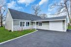 Welcome to this beautifully renovated expanded cape set on a spacious 0.36-acre corner property. This stunning home features 6 generously sized bedrooms and 3 full bathrooms 1 half bathroom, offering ample space for comfortable living. Every inch of this home has been thoughtfully updated, blending modern finishes with classic charm. The heart of the home is the gorgeous kitchen, showcasing sleek porcelain floors, elegant quartz countertops, and brand-new stainless steel appliancesâ€”perfect for everyday cooking or entertaining guests. The open, light-filled layout flows effortlessly into the living and dining spaces. Step outside to your private backyard oasis featuring a covered patio with an awningâ€”ideal for outdoor dining or relaxing in the shade. The beautifully maintained corner lot offers curb appeal and plenty of room to enjoy the outdoors. This move-in ready gem truly has it allâ€”style, space, and location.