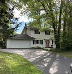 Welcome to this classic Colonial home featuring 3+ spacious bedrooms, 2 full bathrooms, nestled in a desirable, well-maintained neighborhood. This beautifully landscaped 1.2 acre property offers great curb appeal and a peaceful atmosphere. Step inside to find a spacious layout perfect for both everyday living and entertaining. The home includes a large two-car garage and a fully fenced backyard that provides privacy while overlooking the tranquil Fallkill stream from your screened porch - ideal for relaxing or hosting outdoor gatherings. The home offers 2 sitting rooms, large dining rm, office/den, open layout kitchen w/eat-in breakfast area, spacious laundry room, full basement w/walkout and much more. Located close to many Hyde Park historic sites, Walk-way Over the Hudson, Metro-North & Amtrak, restaurants, medical facilities, and several colleges. Donâ€™t miss your chance to own this stunning home in a serene and sought-after location!