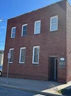 Charming & Versatile Office Space Available in the heart of the Village of WaldenDonâ€™t miss the opportunity to lease this well-maintained, light-filled office suite located in the charming brick building at 11 Orchard Street. Located on the first floor and facing the street, this 750 sq ft space offers excellent visibility and a welcoming atmosphereâ€”perfect for a variety of business types. Refer to the zoning for the Village of Walden.This unique suite features:â€¢ A spacious open area with a beautiful brick fireplace and hardwood floorsâ€”ideal for a showroom, collaborative workspace, or conference room.â€¢ Two private offices for meetings or individual workspaces.â€¢ A private restroom â€¢ Off-street parking available, with additional municipal parking directly across the street.Located in the vibrant Village of Walden, the property is within walking distance of shops, restaurants, and local businesses, making it a convenient and desirable location for both clients and staff. Tenant is responsible for utilities.This is a rare opportunity to lease a distinctive and adaptable space in a great building and location. Schedule your showing today, move in ready!