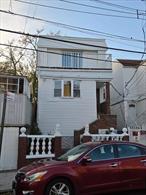Legal 2 family house in heart of Corona. Redone from top to bottom. 2 bedroom 1 bath apartment on 2nd floor. 2 bedroom 1 bath apartment 1st floor. 2 bedroom and 1 bath finished above ground basement. Basement is technically 1st floor since its above ground with separate outside entrance.