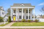 A rare opportunity to own one of the cityâ€™s most distinguished and recognizable homes. This stately residence seamlessly blends timeless elegance with inviting comfort, making it ideal for both refined entertaining and everyday living. The grand columned front porch sets the tone, offering a warm welcome and a beautiful space to unwind or greet guests. From the moment you enter the home, youâ€™ll appreciate the thoughtful craftsmanship and bespoke features throughout. The expansive eat-in kitchen, anchored by a generous center island, flows effortlessly into a formal living room and dining room with high ceilings and a fireplace that invites warmth and relaxation. Step into a family room with lots of light, vaulted ceilings with beams, and a second fireplace, perfect for those relaxing and lazy days. A dedicated library/office space with lots of built in shelving that is perfect for work-from-home days or cozy reading. Rich hardwood and parquet floors, custom built-ins, recessed lighting, and cast iron baseboard radiators enhance the homeâ€™s classic charm, while so many modern updates offer convenience. Generously sized bedrooms feature high ceilings, lighted closets and abundant storage throughout, while the primary bedroom offers an en-suite bathroom. And a third floor unveils a private suite complete with its own full bath, brand new carpeting, and a pool table making it an ideal retreat, guest quarters, or entertainment lounge. Outside, you&rsquo;ll find a three car garage and a fenced in yard perfect for outdoor living. An additional 0.88 acres of land is part of this sale, offering over an acre of property in the City of Port Jervis, which is a rare opportunity! Perfectly located near the Delaware River for whitewater rafting/kayaking, the Watershed Trails for hiking and biking, High Point State Park, a vibrant downtown with restaurants, breweries and shops and easy NYC train accessâ€”this property is as impressive in lifestyle as it is in design!
