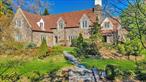 Welcome to 15 Rutland Road, a masterfully restored Tudor nestled in the prestigious Cotswold section of Edgemont. This gem seamlessly blends historic charm with modern luxury. Restored leaded glass windows, arched doorways, French doors, Ludovici tile roof and wide planked oak floors reflect the home&rsquo;s rich heritage. The stone facade and bluestone patio adorned with a fresco-painted mural on the overhang, enhance its timeless appeal. The Chefâ€™s Kitchen is a culinary enthusiast&rsquo;s dream featuring two sinks, Viking range cooktop, double ovens and warming drawer, Liebherr refrigerator, Carrera marble countertops, and built-in Miele coffee machine, adjacent to the sun-filled family room. The first floor has a welcoming entry, oversized living room, formal dining room, eat-in kitchen, powder room and mudroom. The home comes equipped with a full-house generator and surround sound speakers in the living room, kitchen, family room. Spacious interiors and high ceilings from 9 to 10 feet and generously sized rooms create an airy ambiance. The second floor has an over-sized primary bedroom with primary bath and timeless high- end finishes and radiant floor, two ensuite bedrooms and a bedroom and hall bath. The amazing basement is an entertainer&rsquo;s haven with a wine cellar, large entertainment room with built-ins, full bathroom, kitchen with Subzero refrigerator and freezer, dishwasher and microwave, a laundry room, gym and abundant storage, (gym is a potential 5th bedroom). The stone patio/courtyard overlooks the lush grassy area, perfect for alfresco dining. Experience the perfect harmony of classic design and contemporary living at 15 Rutland Road. This distinguished home offers a rare opportunity to own a piece of Edgemont&rsquo;s storied past, thoughtfully updated for today&rsquo;s discerning homeowner!