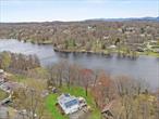 Welcome to your lakefront retreat on the sparkling shores of Beaver Dam Lake in New Windsor, NY! This warm and inviting split-level home offers the perfect blend of comfort, charm, and convenienceâ€”ideal for year-round living or a peaceful weekend getaway. With 3 cozy bedrooms and 1.5 baths, this home welcomes you with an open-concept main living area thatâ€™s filled with natural light and stunning lake views. The heart of the home is the beautifully updated kitchen, featuring a huge center island, granite countertops, and gleaming hardwood floors that flow effortlessly into the living and dining areasâ€”perfect for hosting family and friends or enjoying a quiet evening in.Step outside and breathe in the fresh air from your expansive two-tiered deck, where youâ€™ll enjoy picturesque views of the lake all year long. Whether you&rsquo;re sipping your morning coffee, watching the sunset, or entertaining guests, the setting is nothing short of magical. Youâ€™ll have lake rights and your own private dock with a rowboat included, plus access to the community beach from Memorial Day to Labor Day and additional amenities that make every season special. This home also offers smart features for modern living, including solar panels for energy efficiency, a whole house fan, and ductless air conditioning in the main space to keep you cool and comfortable. A one-car garage and a shed offer plenty of storage, and the location truly canâ€™t be beat.Nestled in a friendly lakefront community, youâ€™re just minutes from local attractions like Storm King Art Center, the scenic Hudson River waterfront, and charming downtown Cornwall with its boutiques, cafes, and farmers markets. For outdoor lovers, thereâ€™s nearby hiking at Schunnemunk and Black Rock Forest, and when it&rsquo;s time to head into the city, you&rsquo;ll appreciate the easy access to public transportation, including Metro-North and major highways.This is more than just a houseâ€”itâ€™s a lifestyle. Come experience the peace, beauty, and community of Beaver Dam Lake living. You may never want to leave.