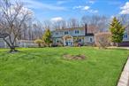 This charming 2-story colonial offers a perfect blend of classic elegance and modern comfort. Located at the end of a cul-de-sac, in a quiet neighborhood bordering a104-acre Suffolk County Park. Offering an entry foyer giving you access to the whole home. Formal living and dining rooms are perfect for gatherings and entertaining, featuring plenty of natural light and ample space. The kitchen is spacious, filled with both functional and stylish elements. Offering a large refrigerator, gas oven, gas range with hooded vent, and granite countertops offer plenty of space for meal prep. Capping it all off you have a wonderful view of the park right outside your kitchen window.  A cozy den, perfect for relaxation, watching TV, or even turning it into your very own personal office. A full basement with carpeted flooring, sheetrock walls and a drop ceiling offer you extra space for whatever your needs may be. This home offers gorgeous, durable hardwood flooring on both upper and lower levels enhancing the homeâ€™s timeless appeal. With a two-car attached garage with side entry providing easy access with your automatic garage openers. A second two car detached garage 24â€™W x24â€™D x17â€™H with a loft for extra storage. Currently setup as a storage with a workshop with cabinets and workspace.     The second level has a beautiful hardwood center hall connecting the 4 bedrooms that allowing for plenty of room for the whole family. The main bedroom offers an ensuite with a full bathroom, walk-in closet, and a second closet for him.  Offering the ultimate in privacy with a large backyard that steps you off into the tranquility of the County Park! With a fantastic full basement layout, large main and upper level living areas, beautiful hardwood flooring on both levels, a ground floor laundry room, Gas Stove, 2 car attached garage, 2 car detached garage, in a cul-de-sac, James Harding vinyl and brick siding, Gutter Guards, Trex decking, and it borders a 104 acre Suffolk County Park.  8 Beverly Ct. is an absolute must-see!