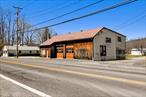 Rare Opportunity to create or invest in this commercial / residential building in high visibility location. This former mechanics shop and most currently a welding shop it offers a multitude of uses and possibilities. Light Manufacturing, Auto Repair, Artisan Studio, Retail, Storage and More! The solid building has 10- and 12-foot overhead doors and ceilings, 2 Rest rooms, Office, and plenty of storage. Off Street Parking plus a detached garage with electric gives 3rd income potential. As a bonus there is a spacious 3 Bedroom, 2 Bath Legal Duplex Apartment with separate entrance that can be a source of income or living quarters for one that wants to work from home. Two meters, furnaces . Recently discovered as one of Hudson Valleys best kept secrets with its delightful shops, cafe, local wineries, farms, parks and proximity to the Taconic Parkway, Stanfordville is sure to be the next must visit town on the Dutchess County map. Don&rsquo;t miss your chance to bring your talents, and dreams and be part of a wonderful community.