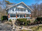 Nestled along the pristine shores of Port Jefferson Harbor, â€œThe Cottageâ€ a 5, 800 square foot English Country Estate set on 3.85 lush waterfront acres with 530 feet of private beachfront is now for sale. Built circa 1906 as the private residence of Ralph Peters, former President of the Long Island Rail Road, the Estate has been preserved and restored as a master class in timeless early American craftsmanship and modern luxury. Step inside and be transported; this is not merely a home, but a living gallery. A reverent celebration of form and function, where flawless millwork and stained glass accents evoke a period era of workmanship. Diamond-pane windows framed with hand-finished grilles wrap the facade and invite natural light showcasing curated interiors filled with original artwork and antique furnishings. The heart of the residence is an awe-inspiring open concept grand room, crowned by a two-story atrium and 360-degree mezzanine. A massive central fireplace anchors the open concept space while the wrap around enclosed porch offers sweeping first-floor vistas of the Harbor, providing an unforgettable sensory experience. A dedicated first-floor study and formal dining room, each with their own fireplace, create a balance of intimacy and grandeur. The primary suite is an oasis featuring a resort-style full marble bath with oversized soaking tub. The homeâ€™s upper level, which includes a formal office and has a dedicated stairwell, offers additional bedrooms and bath, bringing the total for the house to eight bedrooms and four and a half baths. The homes lower level includes a changing room with dual showers, water closet, washer/dryer and direct outdoor access perfect for beach days. Aproned in cobblestone, the long private driveway, auto court and full roundabout provide access to a multi-level and terraced property that includes large sun deck and pergola overlooking the beach. A detached two-car garage complements a property designed and engineered with infrastructure and sustainability in mind. Retaining walls, terraces, patios, walkways and planters are constructed with the finest natural stone, cobblestone, crushed stone, slate and timber. A park-like property adorned in natural, mature perennials and blooming shrubs. A singular North Shore landmark in luxury, where history and heritage meet horizon on the bluffs of Belle Terre.