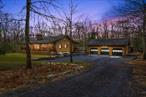 Cozy Custom Log Cabin on 2.77 Acres in the Town of Deerpark â€“ A Must See!Welcome to your dream retreat! Nestled on a peaceful 2.77-acre lot in the scenic Town of Deerpark, this meticulously maintained custom-built log cabin offers the perfect blend of rustic charm and modern comfort. Featuring 3 bedrooms and 2 full baths, this home is an absolute gem for anyone seeking tranquility, character, and quality craftsmanship.Step inside and be welcomed by a spacious living room adorned with a stunning floor-to-ceiling brick fireplace, the heart of the home. The custom beamed ceiling is accented with rustic rope detail, adding a unique and inviting touch. The kitchen boasts a tile floor, breakfast bar, and plenty of space for your culinary adventures.A dedicated mudroom with washer & dryer keeps things tidy, while plush wall-to-wall carpeting adds comfort throughout the home. The Primary bedroom features a beamed ceiling and mirrored double closet doors, creating a cozy and airy atmosphere.Relax or entertain on your expansive front and back porches, perfect for morning coffee or evening sunsets. Downstairs, the full unfinished basement spans the entire footprint of the home and features radiant heat plus a woodstove that efficiently heats the entire houseâ€”huge energy savings on your O&R bill!Outside, a massive 3-bay log garage (36â€™ x 23â€™) awaits, ideal for car enthusiasts, a workshop, or extra storage. Solar panels on the rear roof help power the home, making this not just a beautiful choiceâ€”but a smart one.This property has it allâ€”privacy, charm, efficiency, and space. Truly one-of-a-kind and move-in ready. Come see it for yourself!