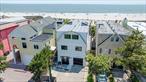 Step into coastal luxury with this impeccably updated 6-bedroom, 4 full bath, direct oceanfront home.Property Highlights:Completely remodeled in 2022 by an award winning contractor.Expansive Open-Plan Living & Dining Areas with wall-to-wall sliders that open to a stunning ocean-view deckGourmet Kitchen featuring premium appliances and sleek finishes.Third-Floor Primary Suite Retreat with breathtaking panoramic views, private oceanfront deck, spa-like en suite bath, and walk-in closet.Two Additional Floors of Living Space with 5 more spacious bedrooms and 3 full bathrooms â€“ room for everyone to spread out.1 Car Garage + 3 outdoor parking spotsRadiant Heat Flooring Throughout, 2-Zone Central AC, Monitored Alarm System, Trex Deck, Roof and Siding all done in 2022
