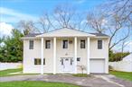 This beautifully renovated Splanch offers the perfect blend of comfort, style, and functionality. Featuring 4 spacious bedrooms, 2 full bathrooms, and 1 half bathroom, this home is ideal for families of all sizes.The main level boasts a sunlit living room with gleaming hardwood floors, a generously sized dining room perfect for family dinners, and a cozy family room with a wood-burning fireplaceâ€”great for gatherings and relaxation. Enjoy cooking in the stunning kitchen, complete with granite counter tops and all stainless steel appliances. Motivated seller. Upstairs, all four bedrooms are nicely sized, including a primary suite with a walk-in closet and a private bathroom. An additional renovated full bathroom adds convenience and modern appeal.Recent updates include a new roof, windows, and siding. The fully fenced backyard with a patio offers a private outdoor retreat, and the circular driveway provides ample parking. There&rsquo;s also a partial basement for extra storage or potential additional living space. It is close to shopping, highways and long island beaches. Donâ€™t miss this move-in-ready gem in a prime Commack location!