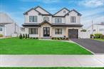 IT IS READY TO MOVE RIGHT IN! INTRODUCING A NEWLY COMPLETED DIAMOND MASTERPIECE WITH THE PERFECT LAYOUT! THIS BREATHTAKING 5-BEDROOM, 4.5-BATHROOM BRAND NEW 2025 CONTRUCTION COLONIAL IS PERFECTLY SITUATED IN THE HEART OF PLAINVIEW. PLAINVIEW SCHOOL DISTRICT. The Home Boasts an IMPRESSIVE 3, 350 SQUARE FEET that is Meticulously Designed & All Perfectly Situated For Your Convenience. Step Inside to Discover a Magnificent Layout Featuring a Spacious Main Level With a Large Bedroom Suite, a Formal Dining Room, and a Living Room That Invites You to Unwind By the Elegant Gas Fireplace & Wet Bar. The Open Floor Plan Seamlessly Connects to a Stunning Kitchen Adorned with Quartz Countertops, Making it a Chefâ€™s Dream Come True! With Gas Cooking for Culinary Enthusiasts and a Garage Equipped With a Charging Outlet, This Home is Ready for Modern Living. Venture to the Upstairs Where You Will Find Four Generously Sized Bedrooms, Each Attached to Full Bathrooms, While the Primary Suite Delights With Two Tremendous Walk-In Closets and a Sensational Bathroom That Feels Like a Personal Spa. The Outdoor Space is Just as Impressive, Featuring a Beautifully Landscaped Yard with Sod Grass, In-Ground Sprinklers, and a Fully Fenced, Flat Yard Perfect for Entertainingâ€”Complete with a Charming Paver Patio. This Home Isn&rsquo;t Just a House; It&rsquo;s a Lifestyle Waiting For You To Embrace!