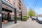 Welcome to the Andrew Jackson Condominium, a well-maintained elevator building in the heart of Historic Jackson Heights. This spacious unit features a beautifully updated kitchen with granite countertops, stainless steel appliances, and ample cabinet space. The open living/dining area features refinished hardwood floors and a functional layout. Enjoy your morning or evening breeze on the private balcony with open-sky views. Additional highlights include generous closet space and a sleek, modern bathroom with clean tile finishes. Amenities include, Laundry Room, Swimming Pool, Recreation Room, Doorman and Building link.