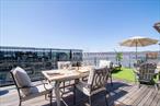 Explore this waterfront abode. Drawing inspiration directly from the surrounding landscape of the Hudson River, this stunning 2-bedroom home is designed with indoor-outdoor flow at the forefront. The large open space feels warm and entirely inviting. Bright and clean features that bring to life the best of modern design with floor to ceiling windows and elevated wood floors, crafted from wide plank oak offering a rustic allure with modern practicality. The kitchen is equipped with high-end appliances, including a Viking stove Bosch Dishwasher and Sub-Zero Refrigerator. The primary bathroom features elegant marble finishes and a soaking tub. Conveniently, this home has private laundry and huge custom closets throughout. One of few, with an enormous 400 sq ft deck offering sensational sunsets and South/West views of the Hudson River. Additional features include a building concierge & reserved parking space in the garage. Youâ€™ll love Tarrytownâ€™s vibrant village with coffee shops, restaurants, the infamous music hall & the jazz forum. Hudson Harbor is a unique, waterfront community with direct access to the gorgeous Riverwalk Pierson Park, fitness center, tennis & pickleball courts, outdoor pool, Yacht Club & Marina, waterfront restaurants and Metro-North express train to grand central.