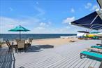 Sunrise, Sunset â€” Your Beachside Oasis AwaitsStep outside your living room onto one of Long Island Sounds highest scoring beaches for water quality. Wake up to beautiful water views and wind down with stunning sunsets from your private bedroom balcony in this spacious and versatile beach home. With 5 bedrooms, 3.5 baths, and over 3, 500 square feet, this legal two-family duplex offers incredible flexibility â€” perfect for a large family, multi-generational living, a dedicated guest suite with its own full kitchen, washer, and dryer, or a legal accessory apartment.Inside, enjoy a blend of comfort and style with ceramic flooring on the first level, hardwood upstairs, recessed lighting throughout, and multiple skylights that flood the space with natural light. A rebuilt stone front facade, first layer roof (2012) and emergency generator add both charm and peace of mind.Step outside to a private side patio with a new hot tub, built-in bar refrigerator, and cooler â€” ideal for entertaining. The expansive deck and patio both feature retractable awnings, and all outdoor furniture is included. And, this is one of the only homes which has a deeded beach to the median high tide water line.This is more than a home â€” itâ€™s a lifestyle. Whether you&rsquo;re watching the sunrise with your morning coffee or enjoying evening cocktails as the sun sets, this property offers a rare opportunity to live the beach life to the fullest.