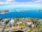 AVAILABLE JULY $20, 000 AUG-LD $20, 000 1 JULY-LD $38, 000 AVAILABLE OFF SEASONWATERFRONT -Dock your boat/swim in your backyard with access to Peconic Bay. This 4 bedroom 4 1/2 bath home is located on a quiet cul-de -sac with beautiful views of Peconic Bay. On the first level, there is an open concept layout with a large eat in kitchen, dining room and living room. In addition, there is 1 bedroom/den, 1 1/2 baths and laundry room. On the second level, there is a primary- ensuite and two additional bedrooms with a shared bath. The lower level/finished basement has a rec room and an additional full bathroom. Conveniently located near Hampton&rsquo;s beaches, restaurants and shopping.,