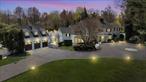 At the end of a long private driveway the exceedingly charming Georgian Colonial aptly styled â€œTwin Pinesâ€ awaits. Quiet luxury and classic architecture strikes a harmonious balance with resort-style amenities set amongst 2 lush acres, providing an exceptional lifestyle for the discerning buyer. Step inside the entrance to find a foyer with original palazzo tile and library with a wood-burning fireplace and a full Creme de Marfil marble topped bar. An expansive living room with custom built-ins, original millwork, and another wood-burning fireplace leads you into a gourmet kitchen; a Chefâ€™s dream composed of Olympian white honed marble countertops, top-of-the-line appliances, including a Subzero, 6-burner Wolf range, two dishwashers and 2 ovens with a generous center island complete with prep sink for entertaining. Down the hall, you&rsquo;ll find the first of 3 laundry rooms with additional subzero refrigerator as well as an All-Seasons room with flush doors opening to your outdoor terrace. The sparkling heated salt-water gunite pool with hot tub, surrounded by recently installed Italian marble pavers and shaded by specimen trees is an entertainer&rsquo;s delight and provides a stunning backdrop for hosting gatherings.The second level accessed by 2 staircases features a bedroom ensuite with custom built-ins, an additional bedroom, bathroom, 2nd laundry room and a primary suite with a custom closet and a sumptuous bathroom with radiant ceramic heated flooring, a double rain head shower, and a free standing soaking tub. A sitting room off the primary suite can be used for an office or a gym and features a double pane bay window along with additional closet space.Between the main level and the basement is a lower level featuring yet another bedroom ensuite with custom built-ins, while the basement features a 3rd fireplace, bathroom, bedroom, additional storage and a 3rd laundry room. A dog run and outdoor workshop with electricity along with a bonus space above a 2-car heated garage are among the endless list of features Twin Pines offers.This stunning estate built in 1937 and nestled in the heart of the highly sought-after neighborhood of Old Brookville, offers unparalleled luxury and tranquility while providing a private oasis just minutes from fine-dining, shopping, equestrian facilities, and clubs of leisure with convenient access to NYC via the LIRR. Located in the award-winning North Shore School District, this is a rare opportunity to own a piece of history on Long Islandâ€™s famed Gold Coast.