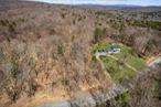 Price Reduced on this South Fallsburg Retreat-Introducing 114 Ranch Hill Road, a turn-key colonial situated on 11.78 acres, being sold with an additional 2.13-acre buildable lot. The house features 2, 160sf spread over two levels plus an un-finished basement, a two-car garage, and a shed. There are four spacious bedrooms, two and a half bathrooms, and a laundry room. The bonus lot is zoned Residential 1 and is a separate parcel, so it can be built on or sold off right away. There arenâ€™t many houses for sale in South Fallsburg, come find your next home today! The house sits on a beautifully landscaped and mostly level clearing, about an acre in size. The rest of the property is wooded and private, with ATV trails and acres to explore, hunt, and play. Massive front and back yards provide ample space for outdoor recreation. Play ball or have a BBQ with enough space for all your friends and family. Love to garden? The property has a wide array of stunning flora, as well as peach, pear, apple, and chestnut trees. In front there is a massive U-shaped driveway and a parking lot leading into the oversized two-car garage. Sit on the partially covered front porch and enjoy the view and fresh mountain air. In the back there is a shed that can fit ATVâ€™s lawn mowers, etc. If you love the outdoors, this is the one for you!The house has been very well maintained by its current owners and is in move-in condition. Recent upgrades include a new roof (2023), new 400â€™ well (2025), and a new storage shed with a front porch (2019). The house has an Ultraviolet water filtration system, Navien hot water on-demand, and propane fired baseboard heat. On the inside, the main floor features a huge living room, a kitchen with ample cabinet space, and a breakfast bar that opens into the dining room. The over-sized laundry room doubles as a Costco room/pantry, and there is also a half bathroom. The upper level offers four spacious bedrooms with good closet space. The primary bedroom has an en-suite bathroom with a shower and the hallway bathroom has a bathtub. The basement currently offers a wood-burning fireplace and excellent storage space, but it is a blank canvas waiting to be finished. You can add guest rooms, a playroom, or even tap into the existing rough plumbing to add another bathroom. The house is located on a quiet stretch of Ranch Hill Road in the desirable hamlet of South Fallsburg. Major Sullivan County attractions including The Kartrite Indoor Water Park, Resorts World Catskills, and Monster Golf Course are less than ten minutes away. Monticelloâ€™s major shopping hub is just ten minutes away, with a Walmart, Shoprite, Home Depot, Old Navy, and Marshalls, just to name a few. Starbucks and Five Below are currently under construction and there is a plethora of local and chain restaurants there as well. Sunshine Estates and J.F.H. Bungalows are both located a half mile away, and Charm Estates is 0.8 miles away.