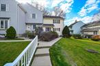 Welcome to this beautifully remodeled townhouse situated in the vibrant heart of the Village of Port Jefferson. This spacious residence encompasses 1, 700 square feet, featuring two generously sized bedrooms and two and a half modern bathrooms. The interior boasts elegant hardwood floors throughout the main living areas, complemented by stylish ceramic tile and plush carpet in the bedrooms for added comfort.Natural light floods the space through high-quality Pella windows, and the sliding glass doors seamlessly connect the living area to an inviting deckâ€”perfect for outdoor relaxation and entertaining. This townhouse also includes three dedicated parking spots, one of which is a private garage, ensuring ample space for you and your guests.Recently refurbished, the unit showcases updated bathrooms and fresh paint throughout, transforming the space into a welcoming retreat. The modern kitchen features brand-new appliances and a central island, ideal for culinary enthusiasts and casual dining alike. Enjoy the convenience of walking to the vibrant town, where you can explore shops, restaurants, and local attractions. This townhouse is a perfect blend of comfort, style, and location.