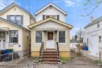 This charming home in Ozone Park offers a peaceful oasis with a fenced-in front and back yard. As you enter the foyer, youâ€™ll immediately notice the arched doorways, an architectural touch that is consistent throughout the home. This area and the living room are incredibly spacious, allowing for various furniture layouts. With four large windows, the front of this home receives abundant natural sunlight. Itâ€™s the perfect space for entertaining guests or simply relaxing after a long day. As you continue through the home, youâ€™ll enter the family room, which can be used in a myriad of ways. The built-in bookshelf might inspire you to make this a library or reading room, but it could also serve as a home office, playroom, and more. The formal dining room features a ceiling fan and easily accommodates a table for six. A large closet and a half-bathroom are conveniently located off this room.Beyond the dining room is a walk-through kitchen with a large window above the sink. There are countertops on both sides for prep work, several cabinets that extend to the ceiling, and gas appliances. The beautiful den right off the kitchen has windows on three sides and a lovely view of the backyard. The enclosed space allows you to enjoy the view year-round. As you ascend to the second floor, you&rsquo;ll discover a window at the top of the stairs and two well-proportioned bedrooms, each offering a peaceful retreat. The primary bedroom has two windows and two closets with a built-in dresser between them. Above the dresser is another arched ceiling with a window. Meanwhile, the second bedroom features hardwood floors and a large closet. The upstairs windowed bathroom has a shower/tub combination, and thereâ€™s a linen closet right outside.The home has a full, unfinished basement with a washer and a sink. This space provides plenty of storage or an opportunity for renovation. Located close to public transportation, schools, restaurants, shops, and groceries, you&rsquo;ll enjoy easy access to all the necessities of daily life. Don&rsquo;t miss the opportunity to make this house your forever home!
