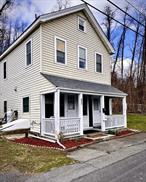 Whether youâ€™re looking for a place to call Home with Income to help pay the mortgage or an Investment Opportunity this Two-Family Home is Ready to Go! Thereâ€™s a 1-Bedroom unit downstairs and a 2-Bedroom Unit up, both in Very Good Condition. Recent Improvements include a Brand New Roof with Gutters (4/25), a New (2024) Navien Tankless Water Heater for the Baseboard Hot Water Heating System and Domestic Hot Water and a New Sump Pump. The Electric Panel has been upgraded also. Great Downtown Kingston Location is walking distance to the Hutton Brickyards, Kingston Point Beach & Kingston Point Park. The Detached Two-Car Garage provides cover for your vehicles and storage and with the New Zoning Code in Kingston thereâ€™s an opportunity for transforming the Garage into an additional Living Unit, with proper approvals of course. There are a lot of reasons to make time to look at this property!