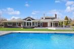 Welcome to 8 Niamogue, located in the heart of the coveted Quogue Estate Section, set on over an acre, merely a block away from Dune Rd. and itâ€™s iconic beaches.This immaculate post-modern includes a sun-drenched living room, a spacious great room with open dining area and kitchen, a den/office, three comfortable bedrooms, two pristine bathrooms, and a generous bonus room offering more living space for you and your guests.Step outside and you&rsquo;re in your own private oasis, complete with an expansive deck, lushly landscaped backyard, heated gunite pool, and outdoor shower.Less than two hours from New York City, just minutes away from the beach, village shops, clubs, jitney stop, and Gabreski Airport, this is a rare opportunity to spend a memorable vacation in Quogue, the quiet gem of the Hamptons.